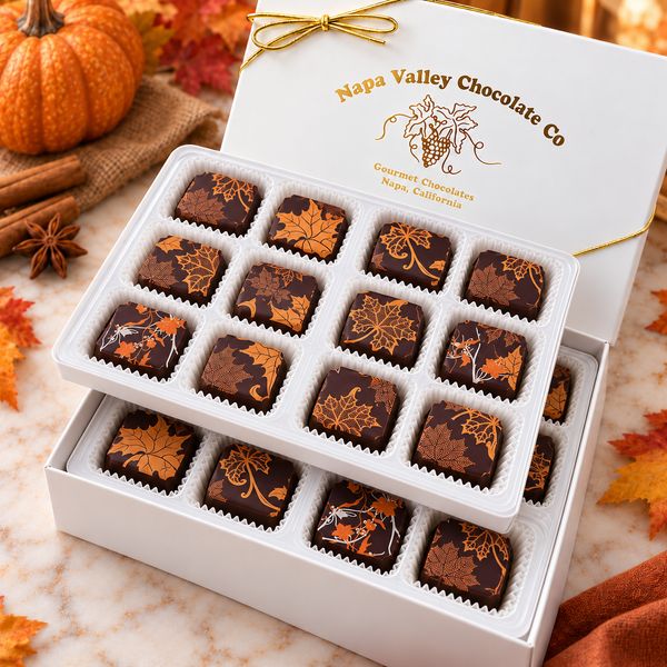 Napa Valley Chocolate Company 24-piece pumpkin spice caramel gift box featuring two stacked trays of handcrafted dark chocolate caramels decorated with copper-bronze autumn leaves.